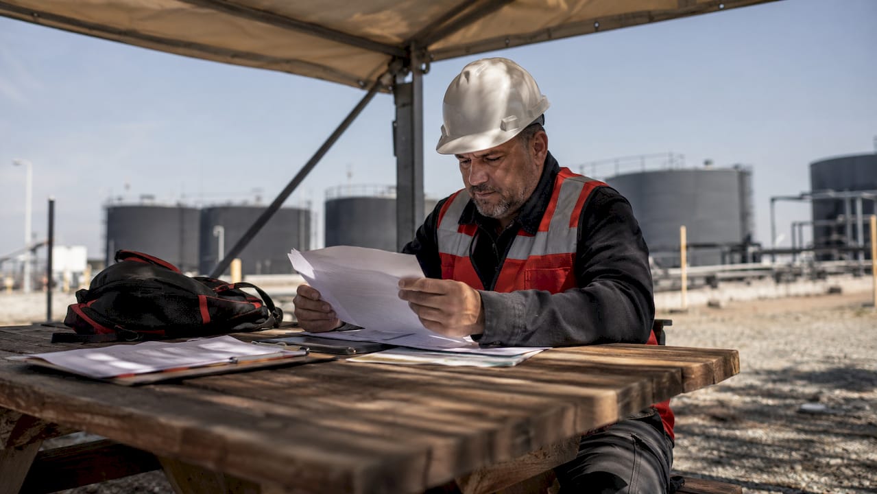 Procurement manager reviewing diesel fuel contracts
