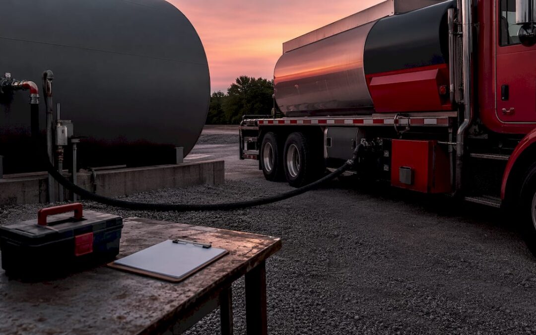 Unbranded fuel delivery tanker refilling bulk storage tank