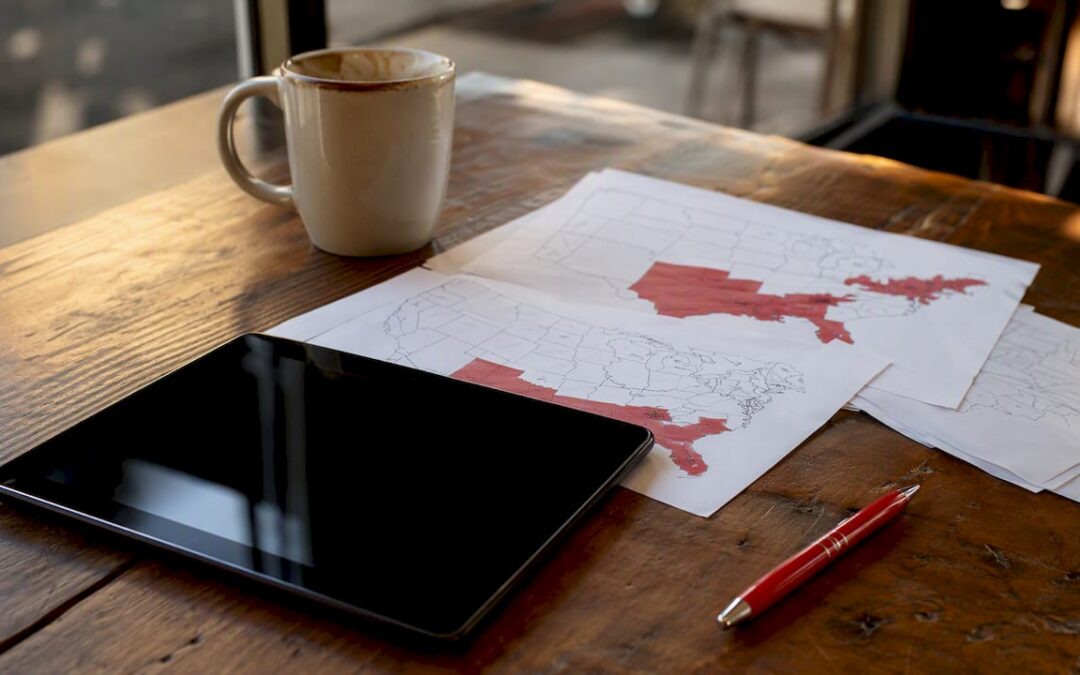 Tablet and printed map highlighting fuel price regions