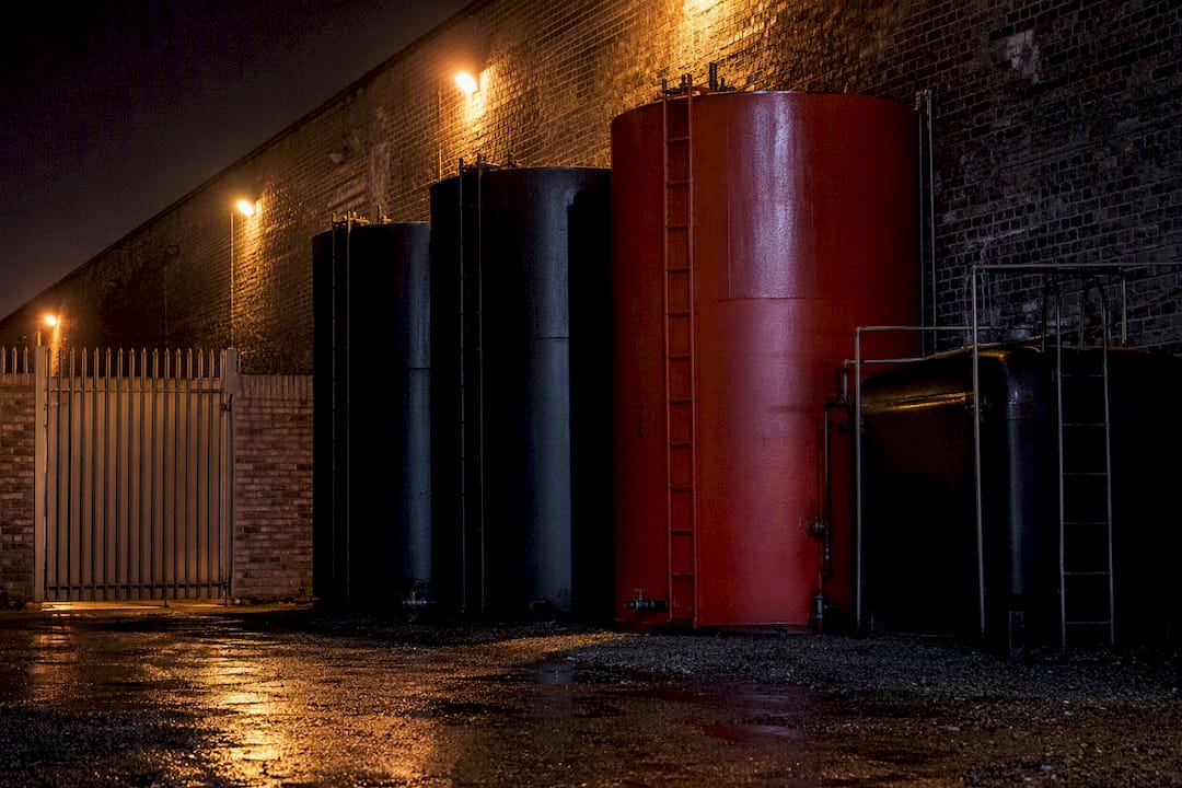 Nighttime fuel tanks parked nose-in at secured site