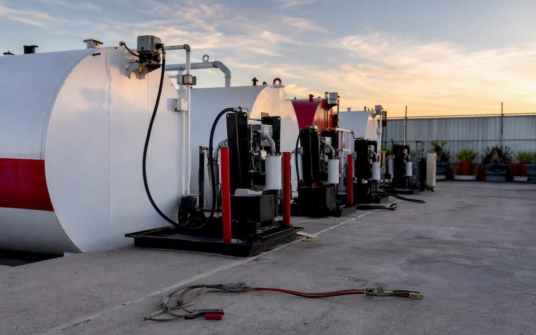 Fuel storage tanks and pumps in trucking yard