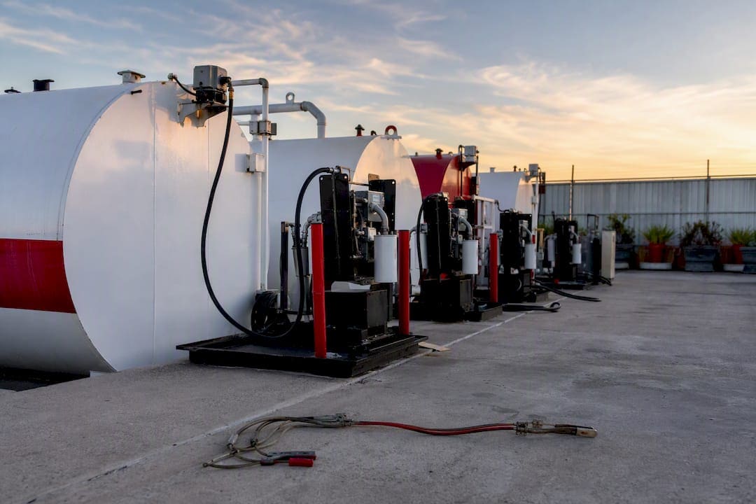 Fuel storage tanks and pumps in trucking yard