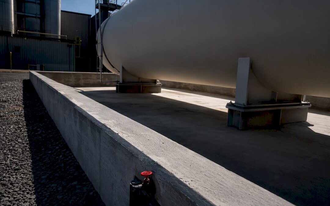 Unbranded fuel tank inside containment berm