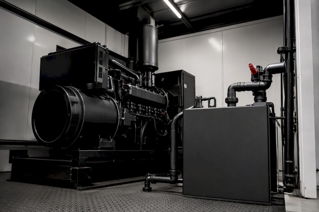 Emergency generator fuel testing enclosure