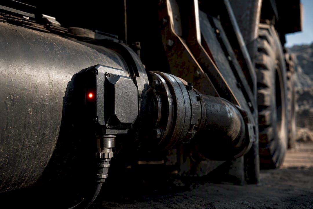 Telemetry sensor beside mining equipment fuel tank