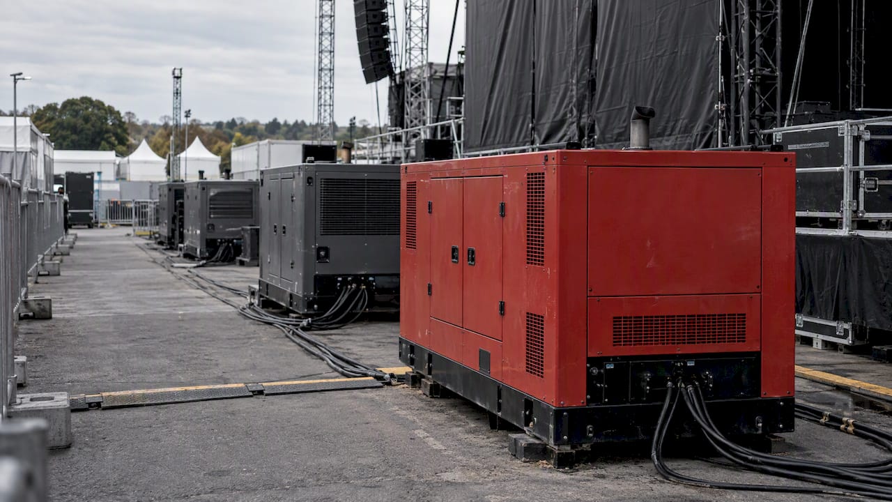 Portable generators staged at an empty event venue