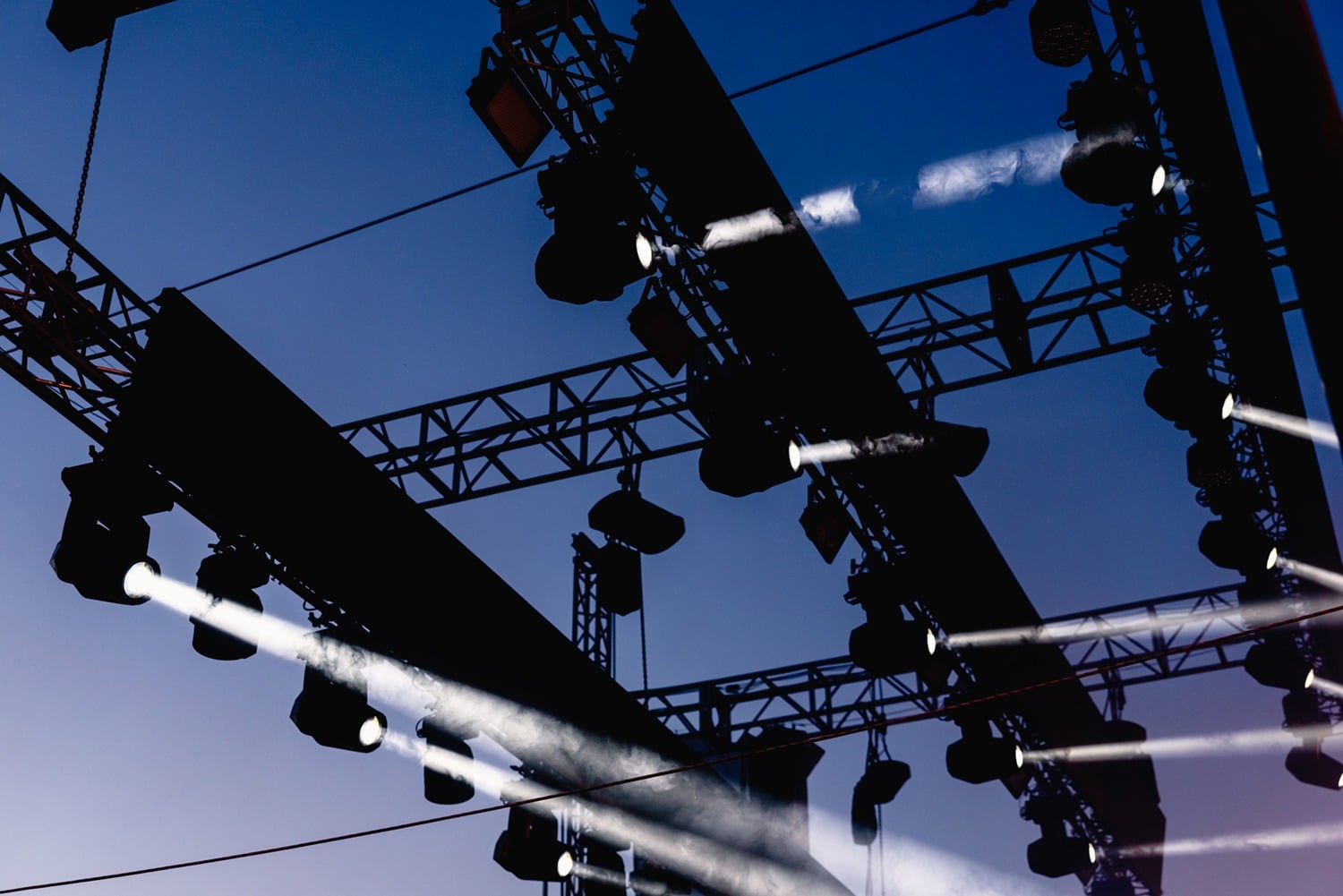 Installation of spotlights to illuminate a musical concert during rehearsals. diesel fuel delivery for events and entertainment Installation of spotlights to illuminate a musical concert during rehearsals. diesel fuel delivery for events and entertainment